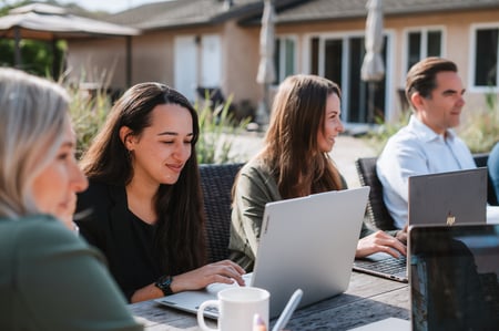 Finance team collaborating on budgets – accounting services