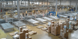 large warehouse with loading tables and lots of boxes