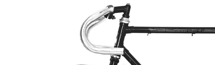 Close-up of a bicycle's handlebars and frame