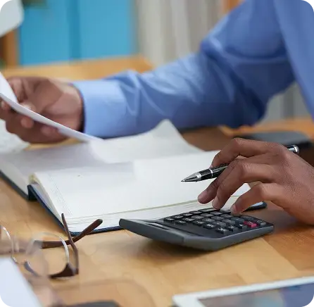 Accountant carefully reviewing vendor payments and AP workflows to prevent errors.
