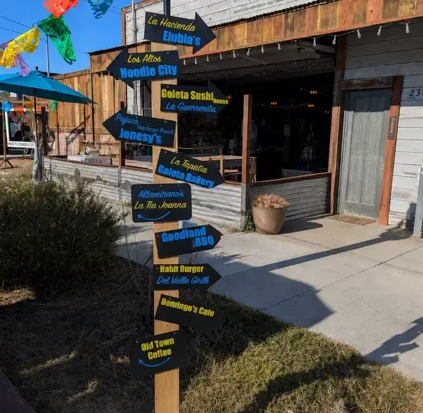 Old Town Goleta signpost for local restaurants representing businesses using our outsourced accounting.