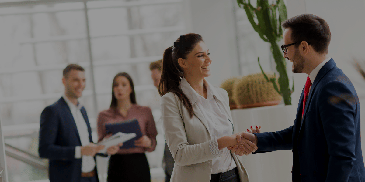 Guideline and Gusto logos over a business handshake, announcing Gusto’s agreement to acquire Guideline to streamline payroll, benefits, and 401(k)