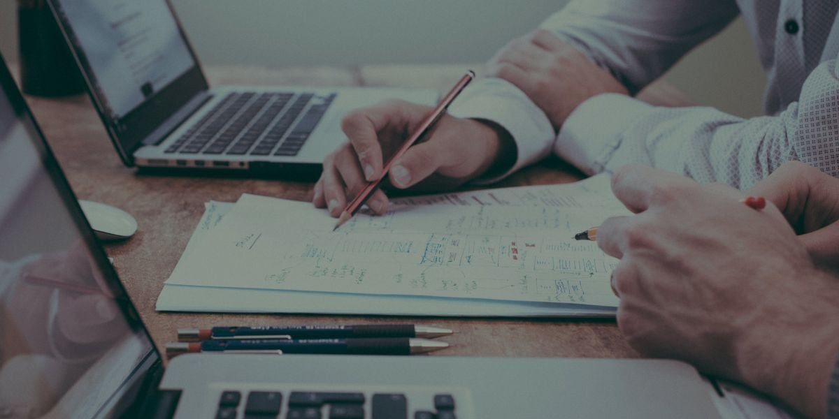 Team reviewing Santa Barbara nonprofit accounting reports and financial documents for better cash flow visibility and reporting