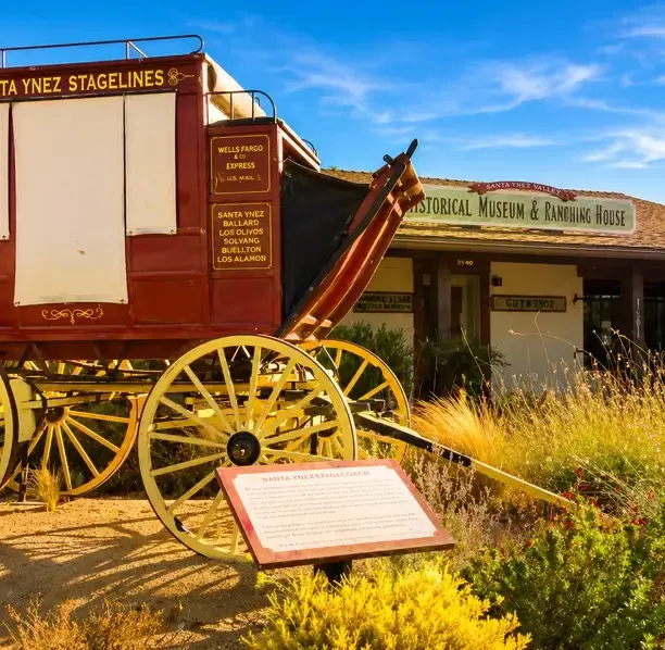 Historical museum stagecoach in Santa Ynez, symbolizing local enterprises scaling with our fractional CFO services.