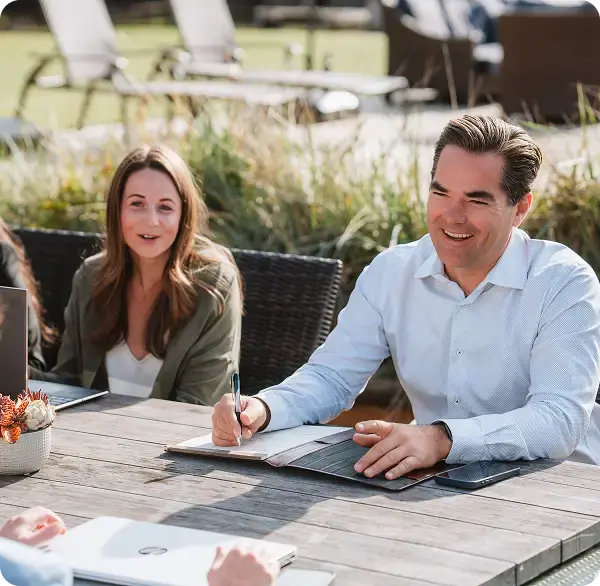 Collaborative meeting discussing scalable financial services and accounting strategy.