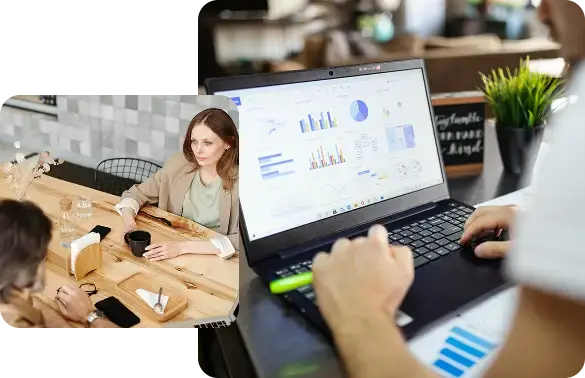 Business leaders turning financial statements and dashboards into strategic clarity in a meeting.