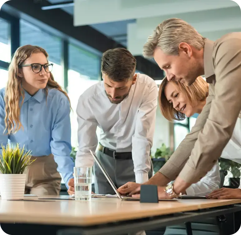 A professional team collaborating on a data-driven financial roadmap and strategic growth planning.
