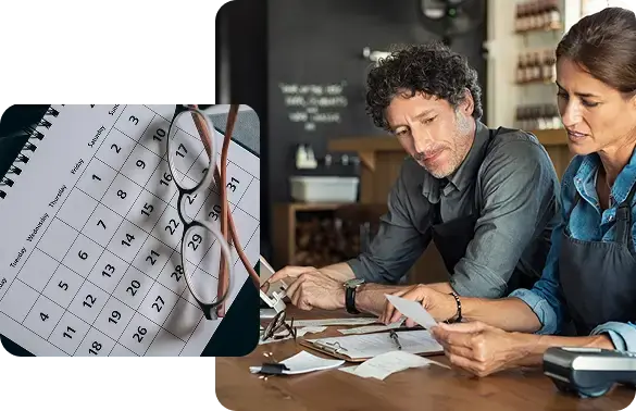 Business owners reviewing a calendar and paperwork to ensure an accurate and structured month-end financial close.